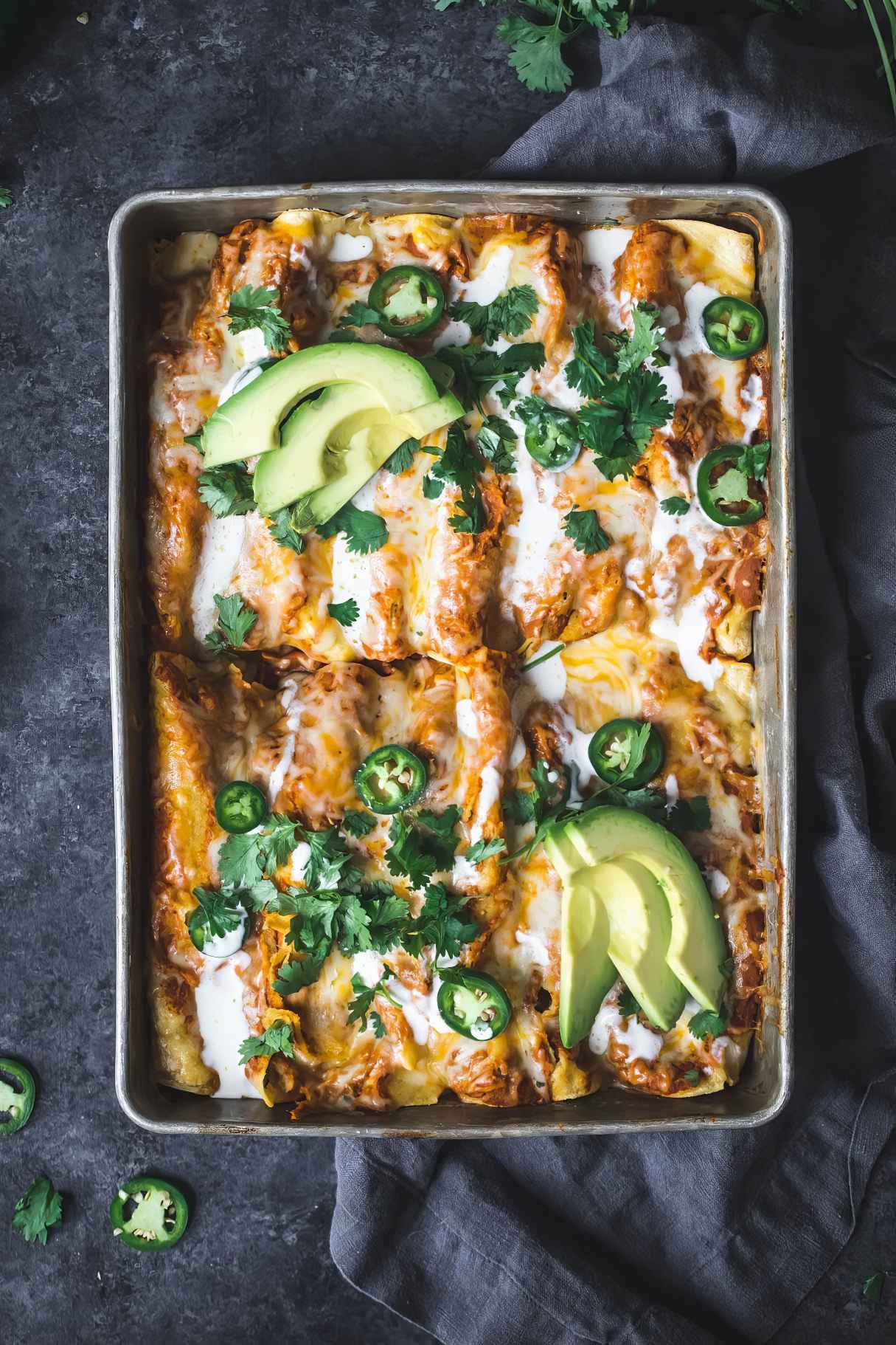 Spicy Black Bean Chicken Enchiladas with Pumpkin Sour Cream Sauce