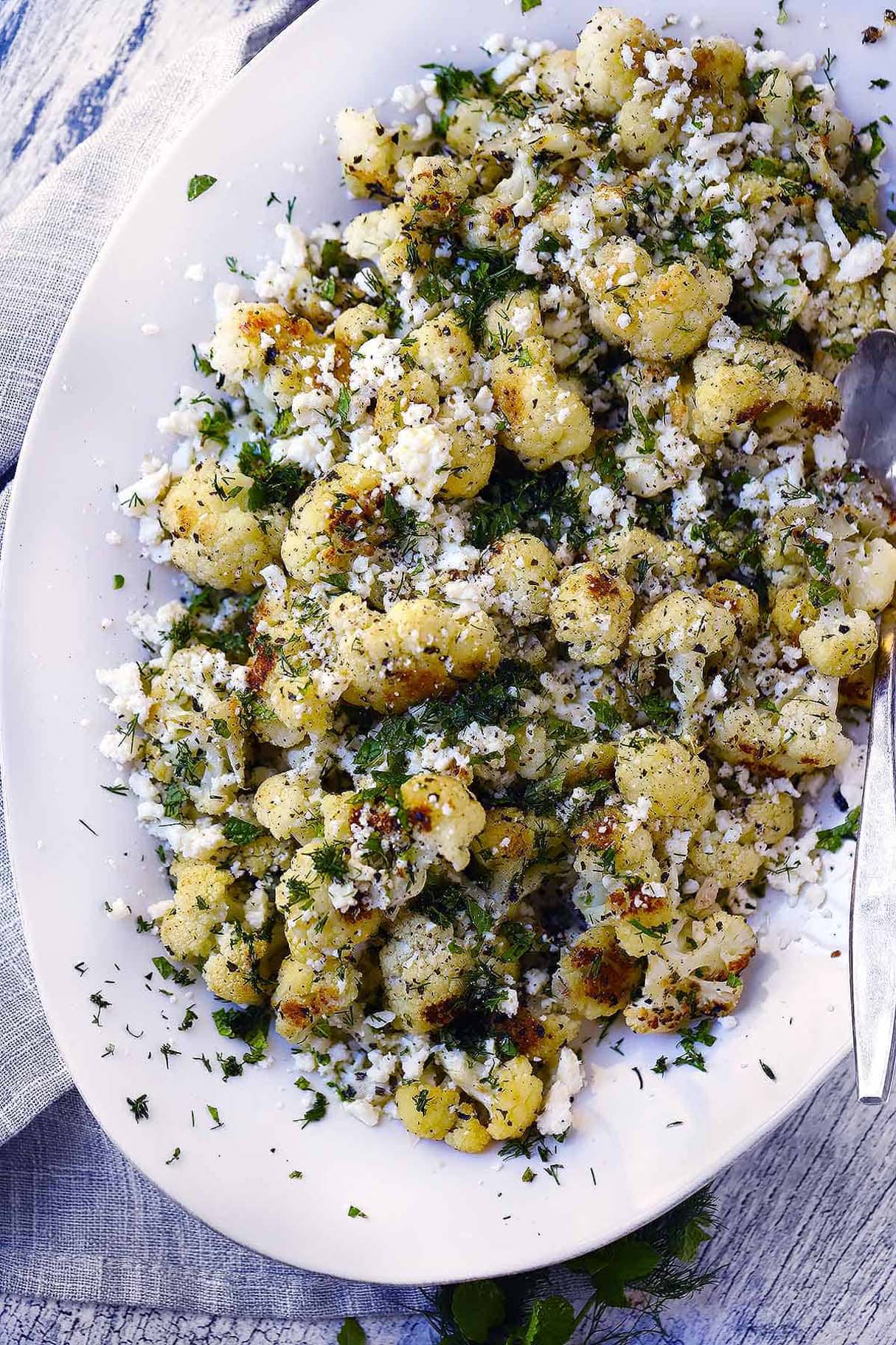 Greek Roasted Cauliflower Loaded with Feta and Herbs