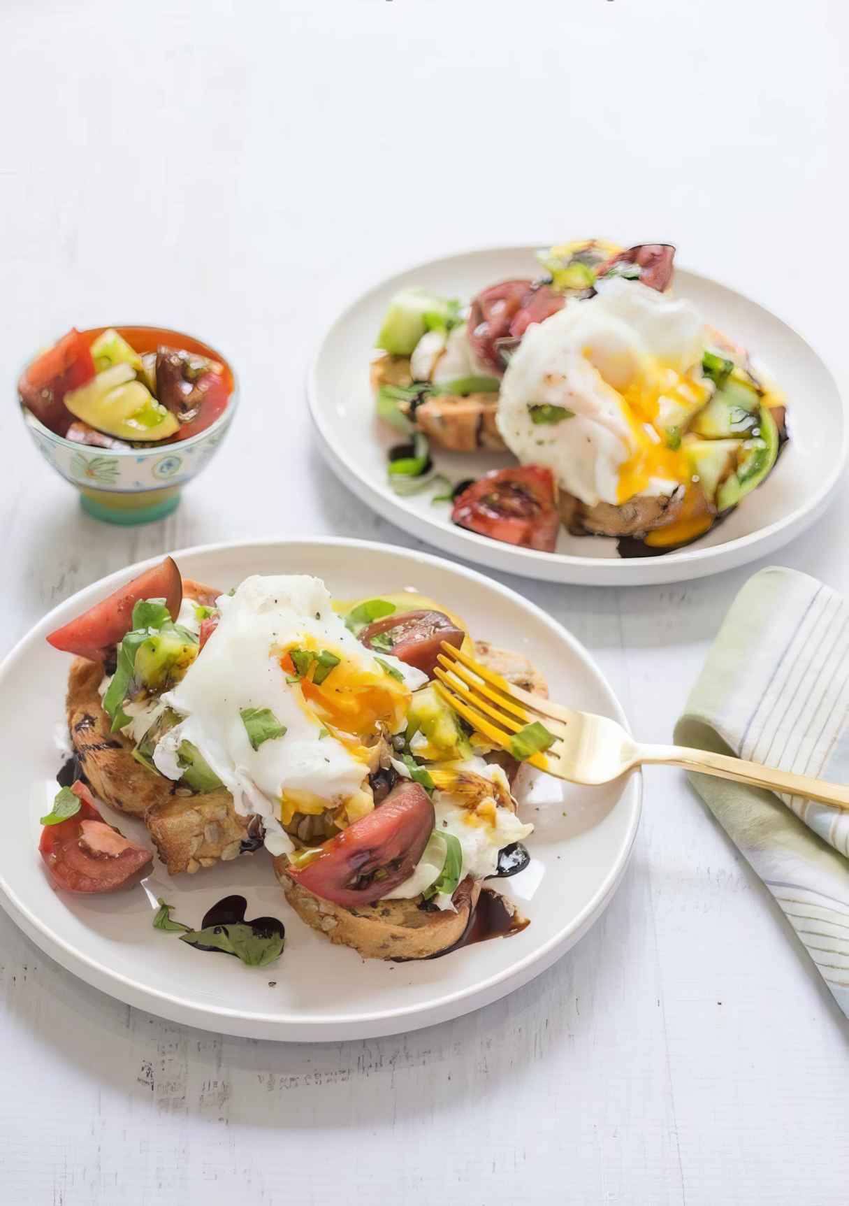 Heirloom Tomato Burrata Toast with Poached Eggs!